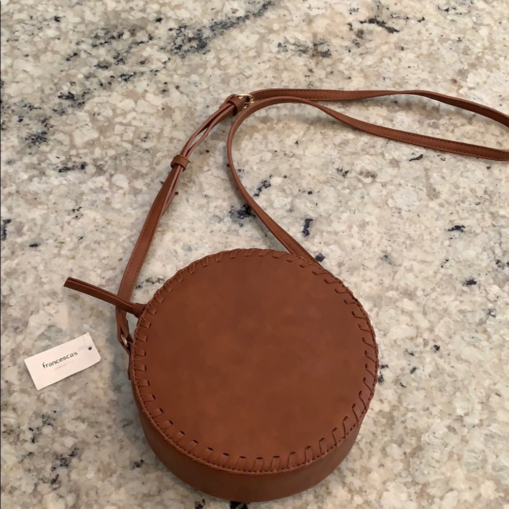 Francesca’s round crossbody purse.